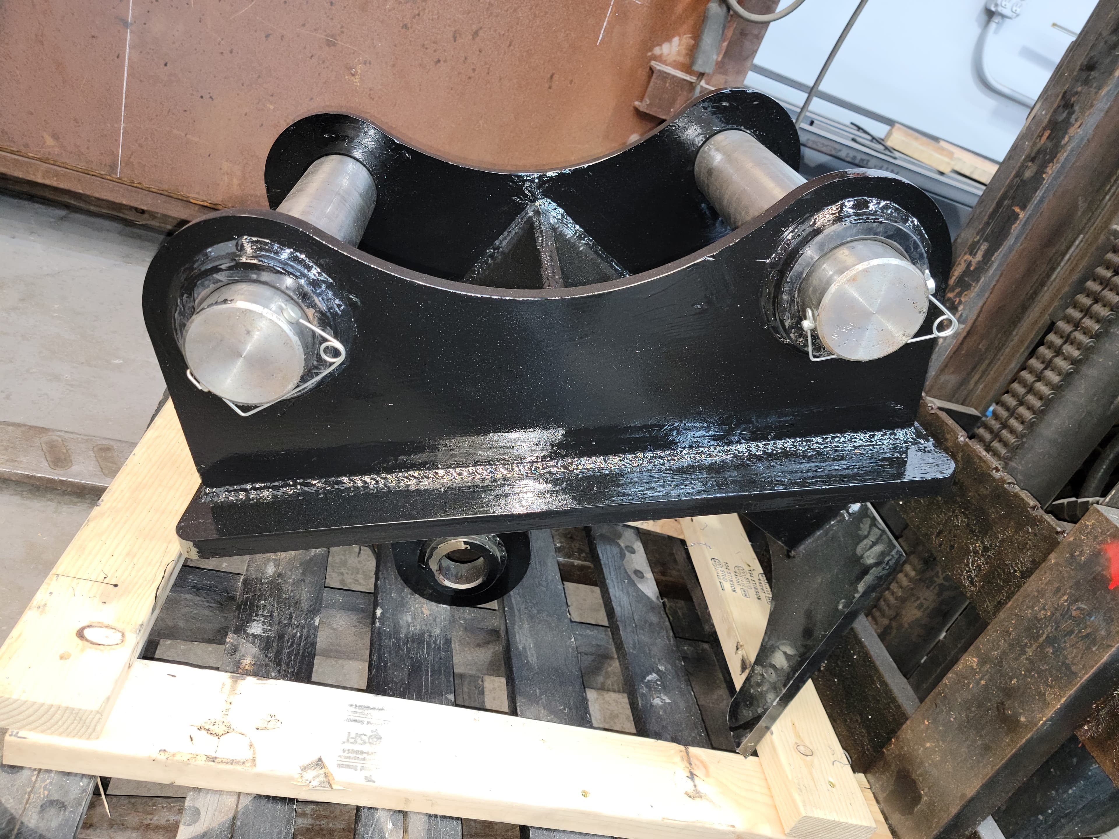Caterpilar adapter bracket custom fabricated.