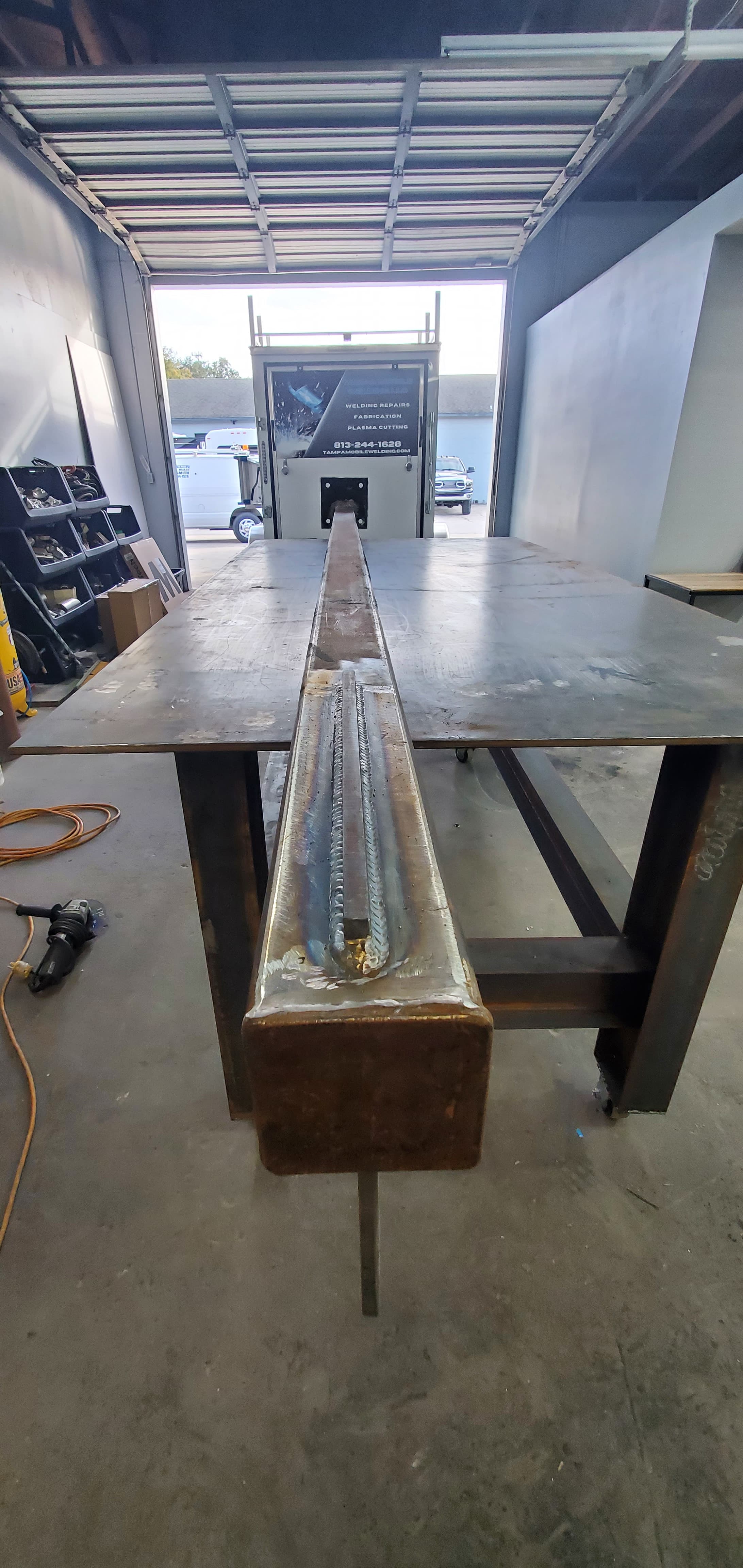 Structural steel support fabricated according to engineering print.